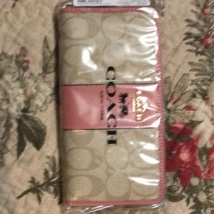 Coach leather zip wallet tan & light pink.